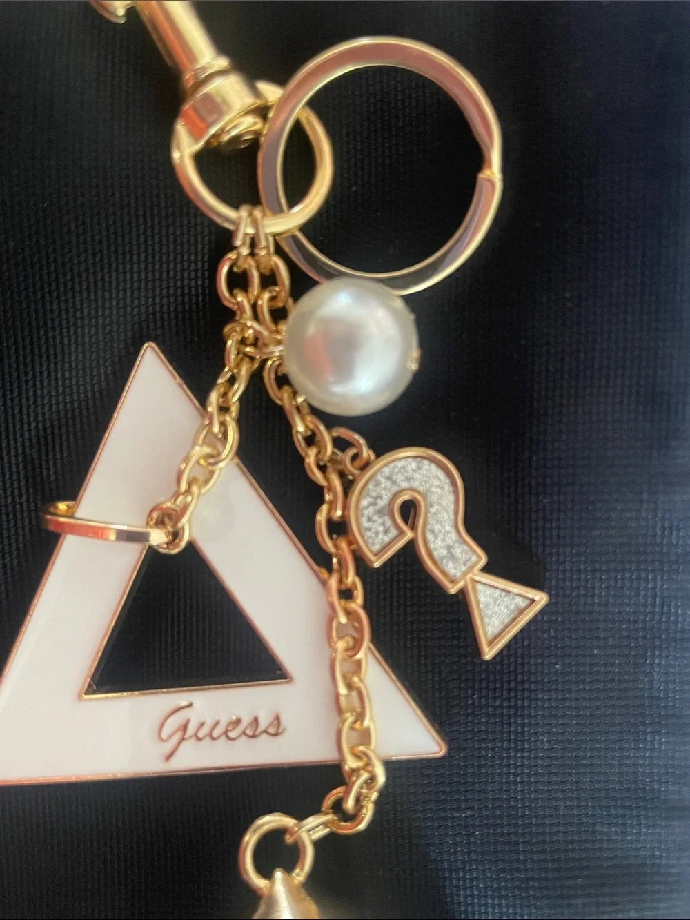 GUESS White and Gold Logo Tassel Keyring Charm